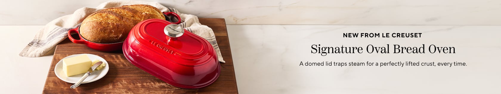 New from Le Creuset signature oval bread oven. A domed lid traps steam for a perfectly lifted crust, every time.