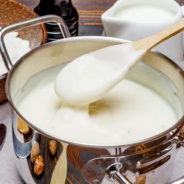 Parmesan Béchamel white sauce in copper pot
